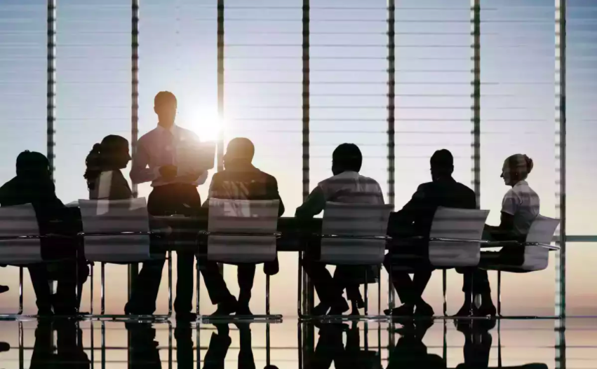 business Team collaborating in a sunny office