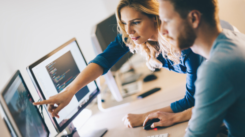 Programmer working in a software developing company office